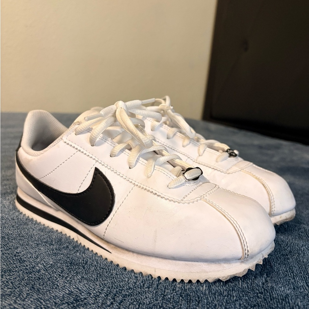 White and Black Nike Cortez